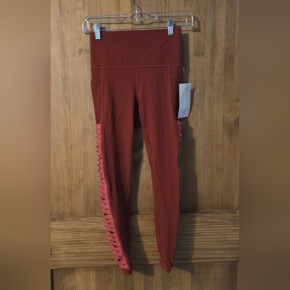 Athleta Rusty Red Mesh Salutation Stash Pocket 7/8 Leggings